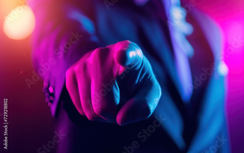Confident Businessman in Suit Pointing Finger at Camera