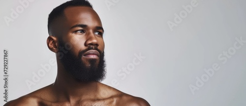 Closeup profile photo of macho attractive african american guy well groomed look empty space seriously isolated white color background photo