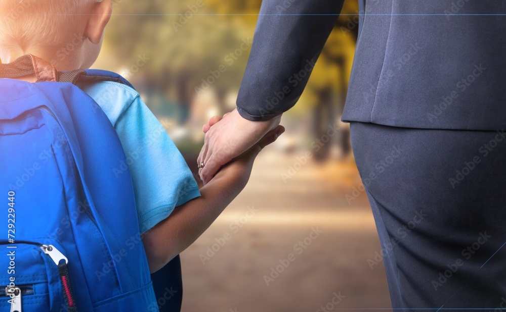Naklejka premium Child holding mother hand. Happy family