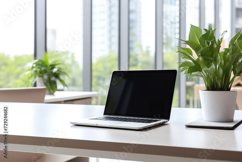 Wallpaper Mural Modern office space with a laptop, bright ambiance. Ideal for work or study in a sleek environment Torontodigital.ca