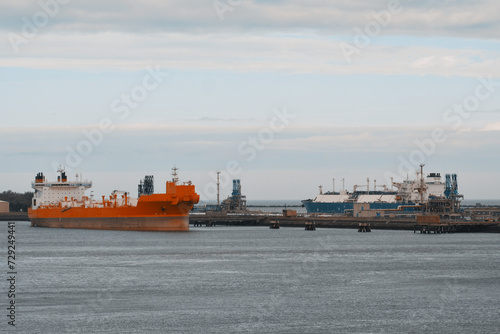 Oil Shuttle Tanker With LNG Carrier In The International Trade Port During Cargo Operation Process