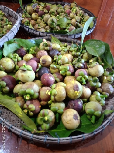 Mangosteen  a sweet  purple fruit from a Thai garden.