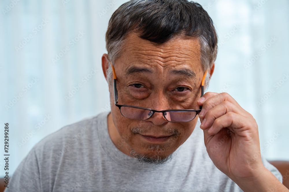 Senior Man Squinting Eyes and Take off put on glasses, Having Problems With Vision, Ophthalmic Issue, Bad Sight In Older Age, wearing eyeglasses posing against looking with wide opened eyes