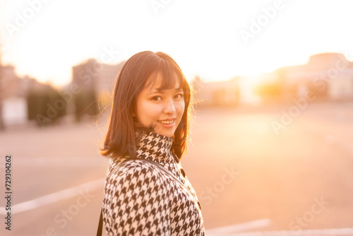 夕日の女性 photo