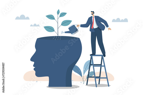Growth of mental state, Personal growth, Self improvement, Development or improvement of personal concept, Learning professional level, Business man is watering the plant that grows from himself.
