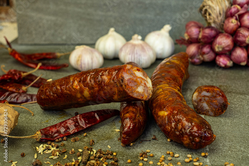 Canvas Print Yunnan Chinese sausage with spices sitting on a stone plate