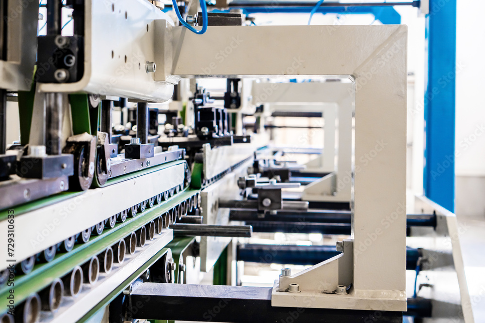 A industrial commercial envelope making machine, making paper envelopes for international distribution. Automated engineering machinery for mass production of paper envelopes. A industrial commercial envelope making machine, making paper envelopes for international distribution. Automated engineering machinery for mass production of paper envelopes.