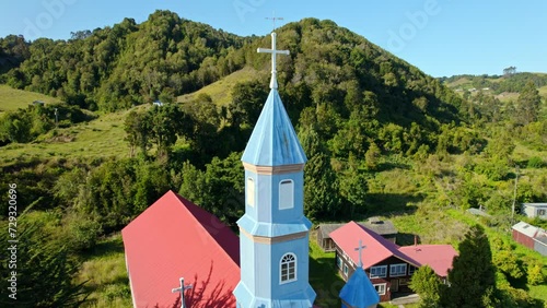 Aerial Panoramic Landscape of Chiloé Patrimonial Church, Tenaun Hills, Skyline and Blue Architecture, Religious Landmark photo
