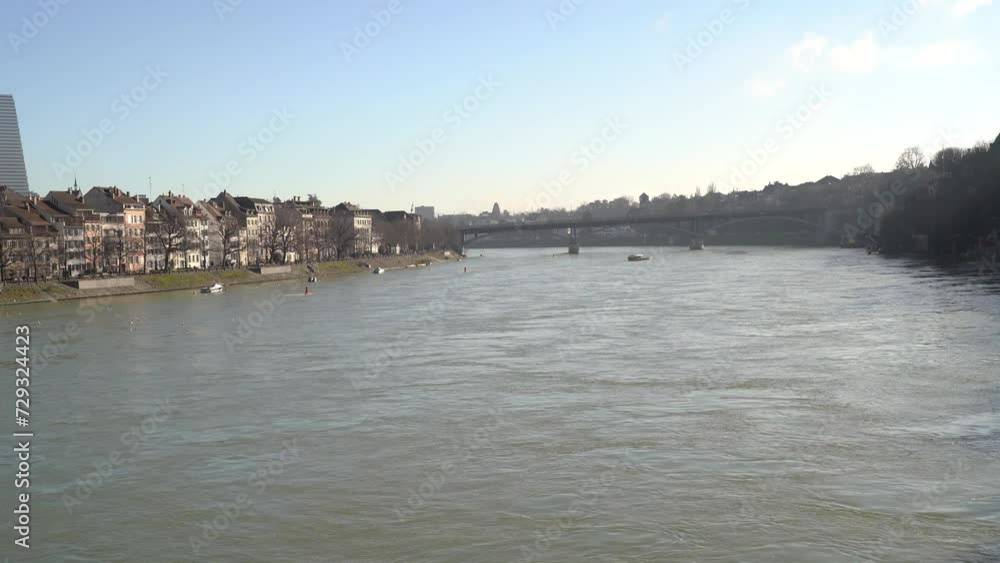 Walking over a bridge with view on Rhine river in Basel Switzerland Walking over a bridge with view on Rhine river in Basel Switzerland