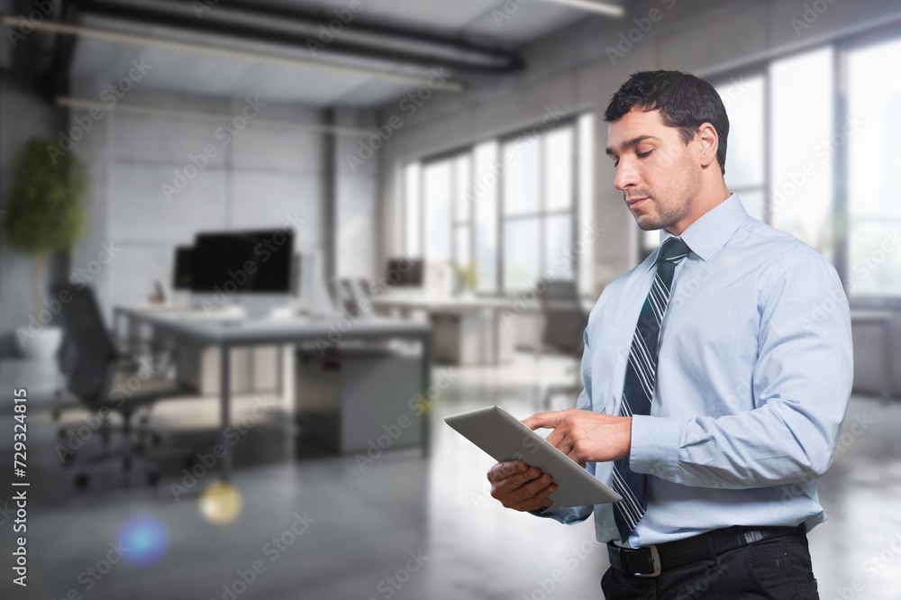 Happy business man using digital tablet. Happy business man using digital tablet.