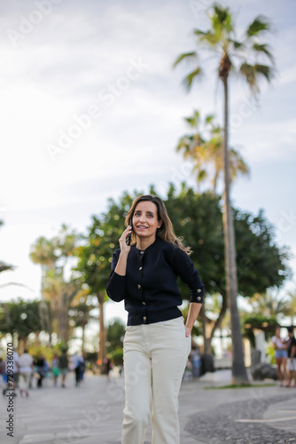 Beautiful mature woman walking streets