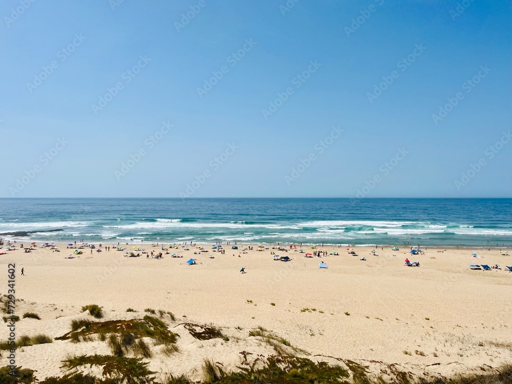 Ocean beach, sand beach, ocean coastline, people on the beach