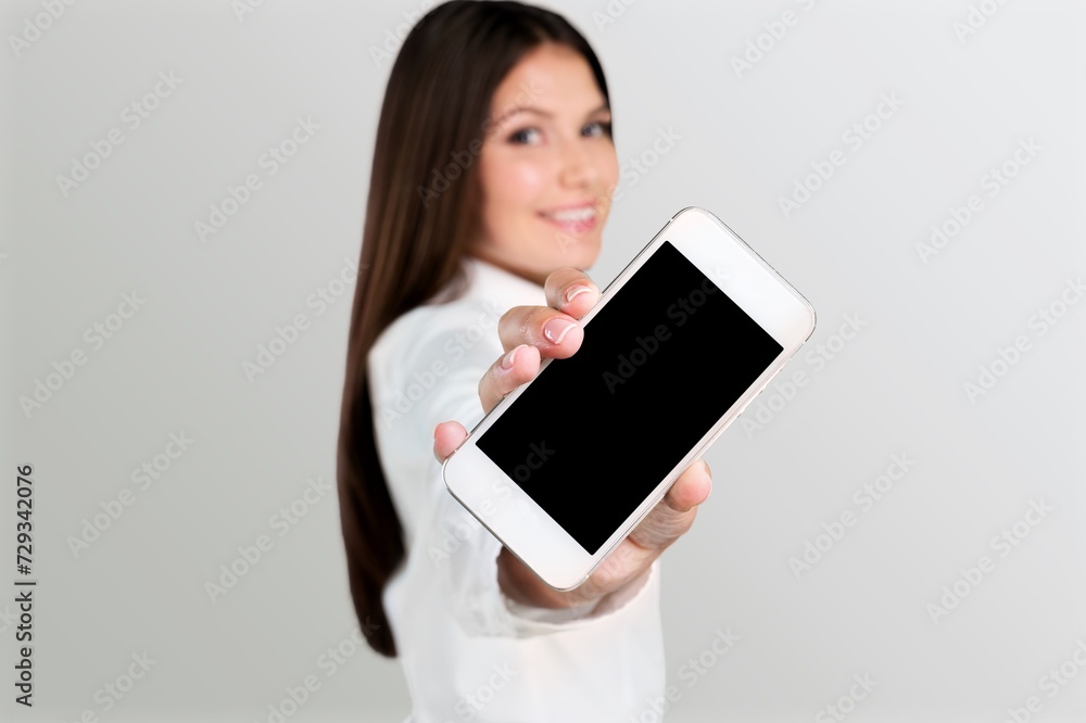 Young female  hold the mobile phone