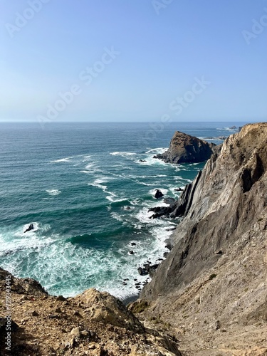 Rocky ocean coast  ocean bay  blue sky