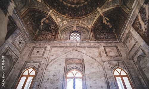 Interior of an ancient mosque with decoration in the ancient city of Bukhara in Uzbekistan on a cloudy summer day