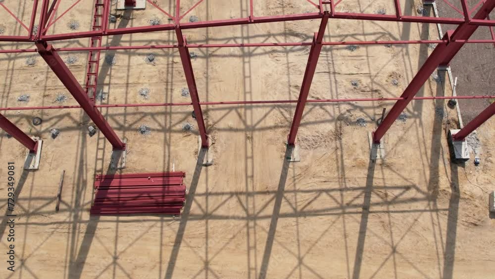 View of the construction site of a large factory in the countryside, filming an aerial video View of the construction site of a large factory in the countryside, filming an aerial video