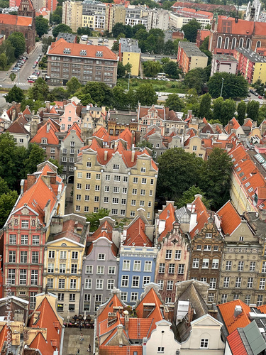 Stunning view from above of Gdańsk old town with multicolored beautiful architecture buildings and red roofs