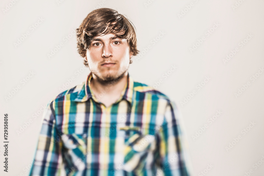 Studio portrait of young man. Munich, Germany Studio portrait of young man. Munich, Germany