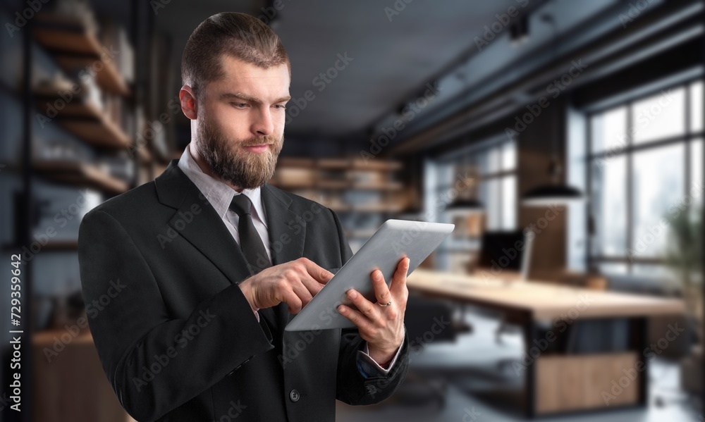 Smiling professional young business man in office Smiling professional young business man in office
