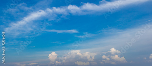 view of bright blue sky with white clouds