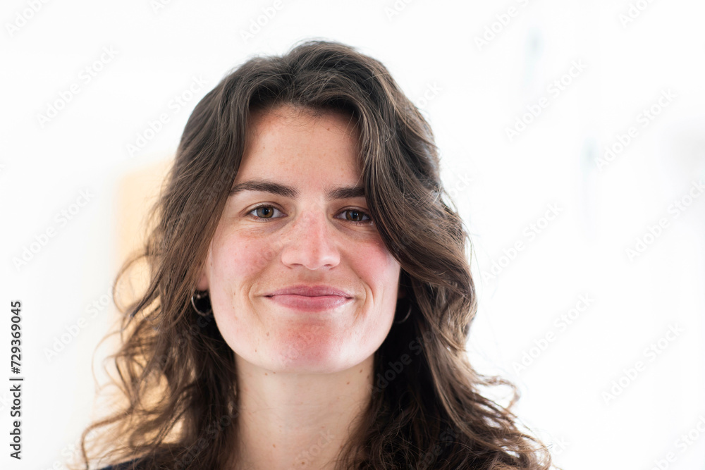 Young woman portrait at home, smiling Young woman portrait at home, smiling