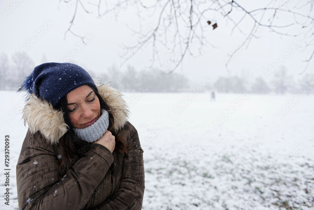 Woman under a snowfall, Milan, Italy Woman under a snowfall, Milan, Italy