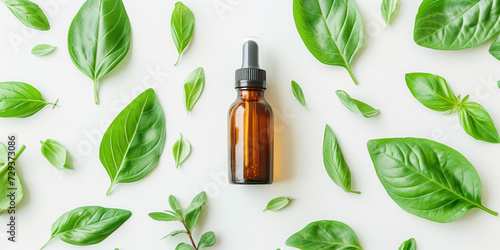  Aromatherapy herbal treatment beauty treatment serum natural face and body care. Organic essential oil in dark glass transparent bottle and fresh leaves on white background photo