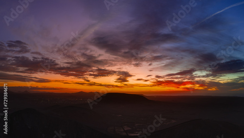 Wallpaper Mural Spectacular sun set image over Volcan Calderon Hondo volcanic crater silhouetted against the setting sun and skyscape near Corralejo, Fuerteventura, Canary Islands, Spain Torontodigital.ca