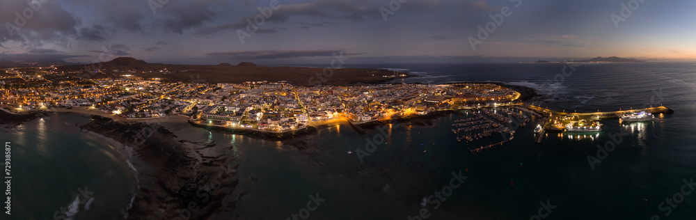 Spectacular aerial panoramic landscape image of the evening night sky over the town of Corralejo, Fuerteventura, Canary Islands, Spain