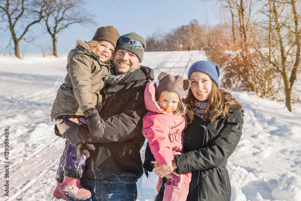 family having fun in winter family having fun in winter