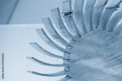 Close up scene the circular blade shape of aluminum profile extrusion manufacturing concept. photo
