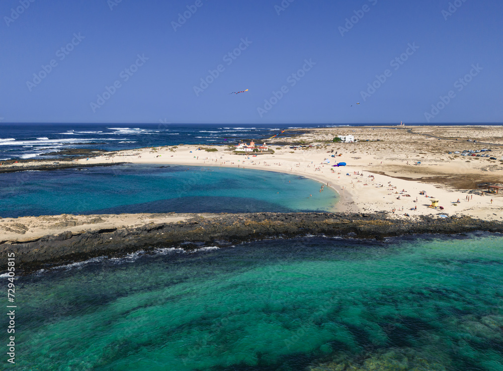 Aerial mid level panoramic view of El Cotillo town and beaches near Corralejo in Fuerteventura Canary Islands Spain