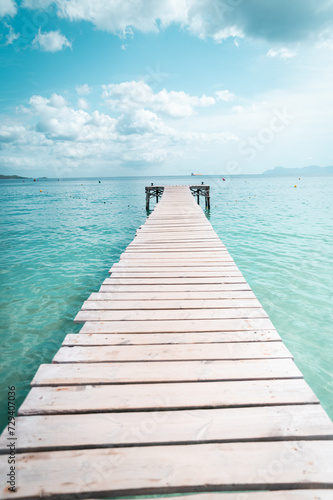 wooden pier on the turquoise sea