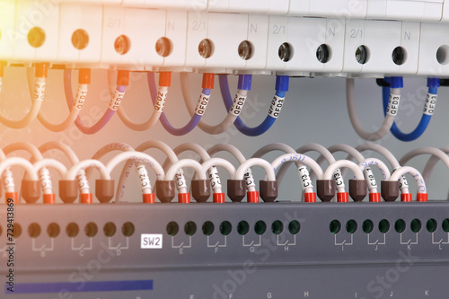 Marking of insulated wires with a tape on which the marking is printed.Sunflare.