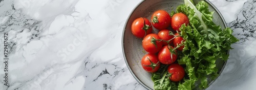 selection of healthy vegetables in a bowl on light marble