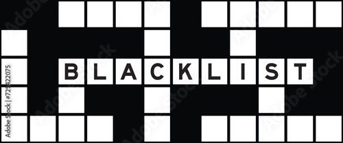 Alphabet letter in word blacklist on crossword puzzle background