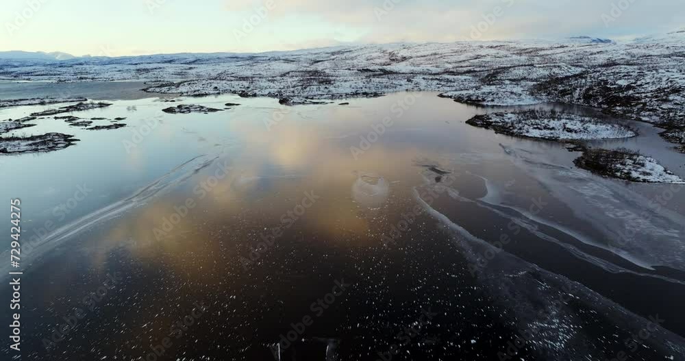 Winter's Brush: Aerial View of a Partially Frozen Lake in Norway Winter's Brush: Aerial View of a Partially Frozen Lake in Norway