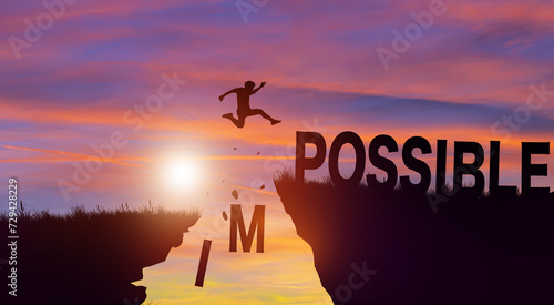 Silhouette man jumping over impossible and possible wording on cliffs with cloud sky and sunrise. Never give up, Success challenge, and Positive mindset Concept. photo