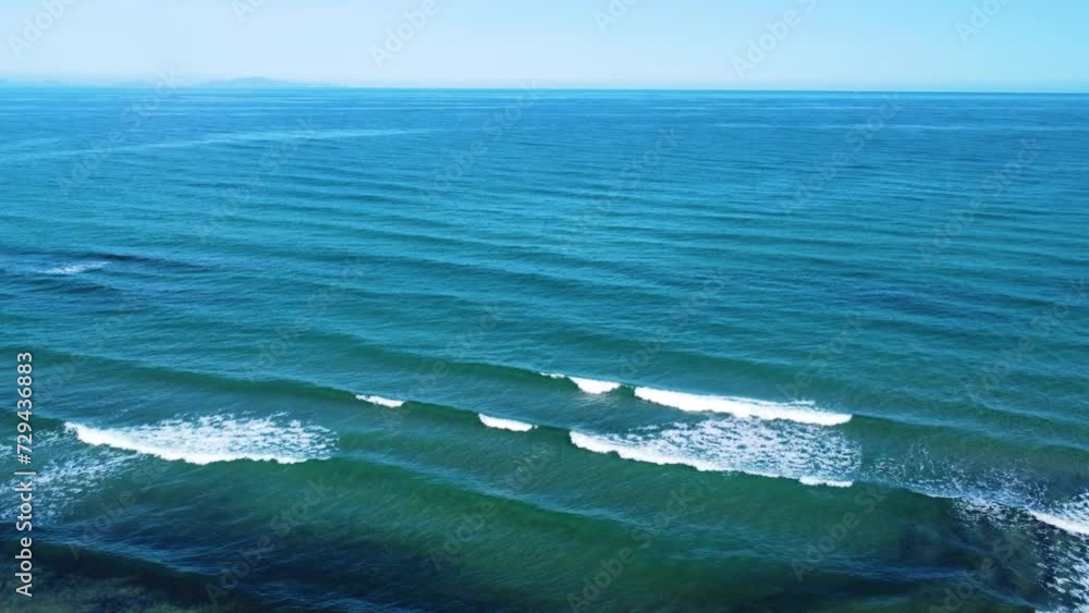 Aerial view of small waves on a sunny day. Sardinia, Italy Aerial view of small waves on a sunny day. Sardinia, Italy