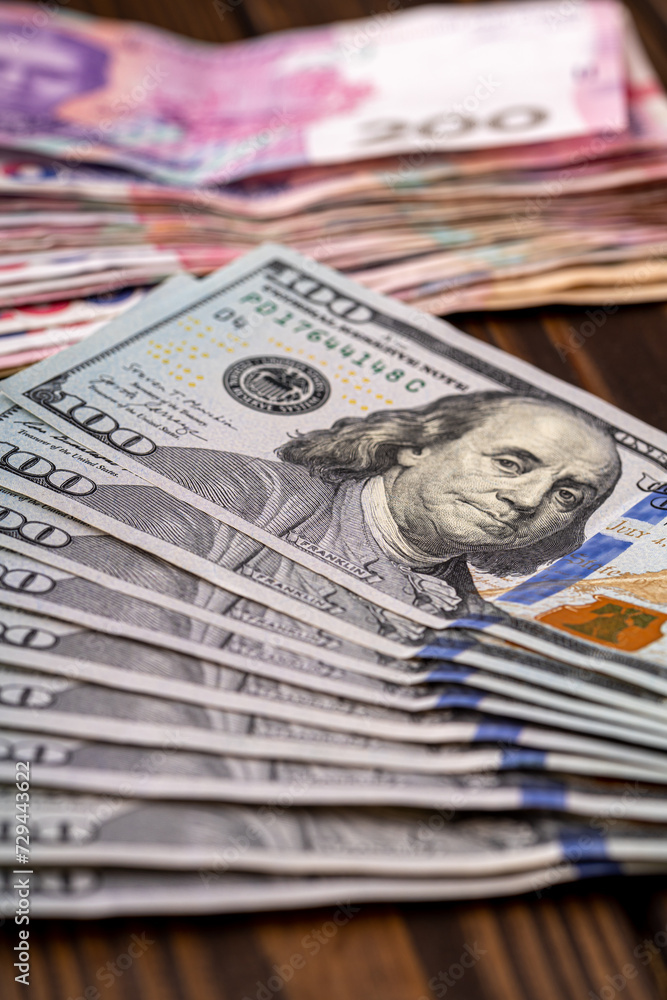 Dollar banknotes of the USA. Amerikan dollars. Money of USA and Ukrainian hryvnia. Dollar banknotes of the USA. Amerikan dollars. Money of USA and Ukrainian hryvnia.