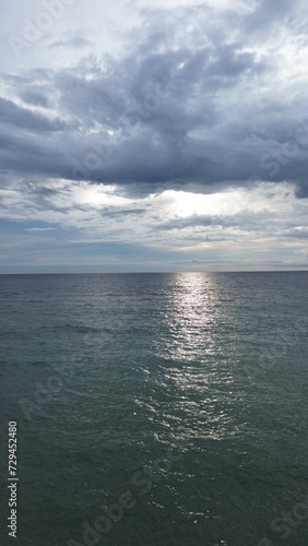 Aerial view of the sea and sky with clouds. Top view.