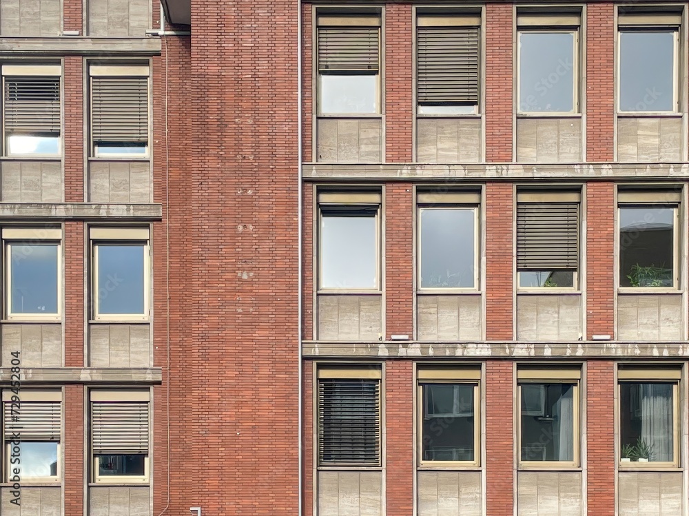 Fototapeta premium residential building with rows of windows from the 60s