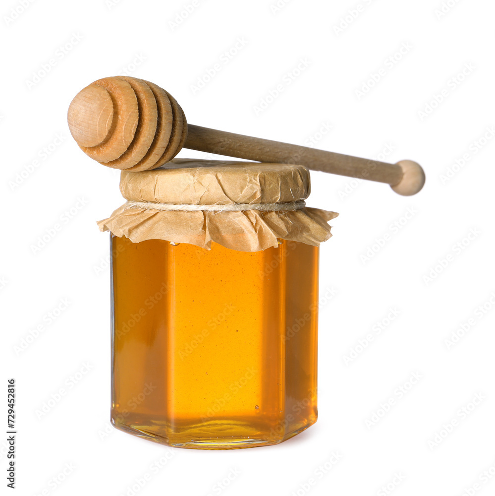 Tasty natural honey in glass jar and dipper isolated on white Tasty natural honey in glass jar and dipper isolated on white