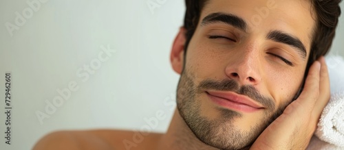 Cosmetic clinic offers Dermastamp treatment for men using fractional mesotherapy. photo