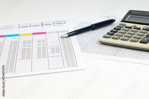 Financial Charts, graphs, coins, calculator on isolated white background.