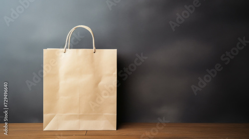 Eco-friendly shopping bag on wooden table and grey background