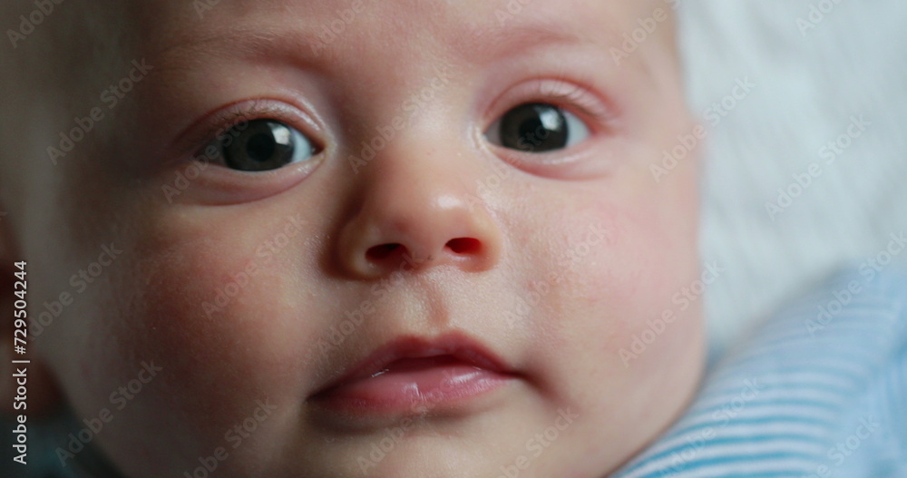 Baby newborn face closeup expression detail macro