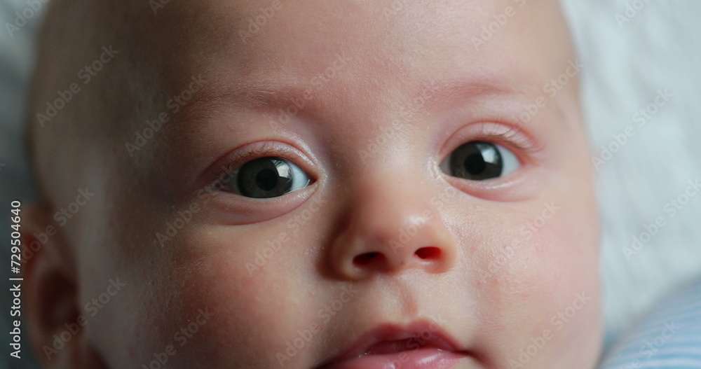 Baby newborn face closeup expression detail macro Baby newborn face closeup expression detail macro