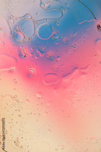Iridescent colorful abstract background with bubbles, fluid texture pastel tones curvy wavy good vibes