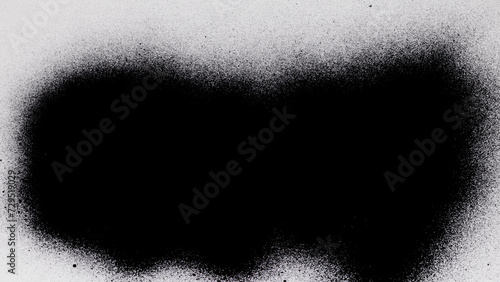 Black Spray Paint On A White Background photo